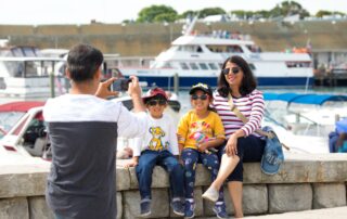 Family Pic with Mackinac Island Ferry Compnay in Background